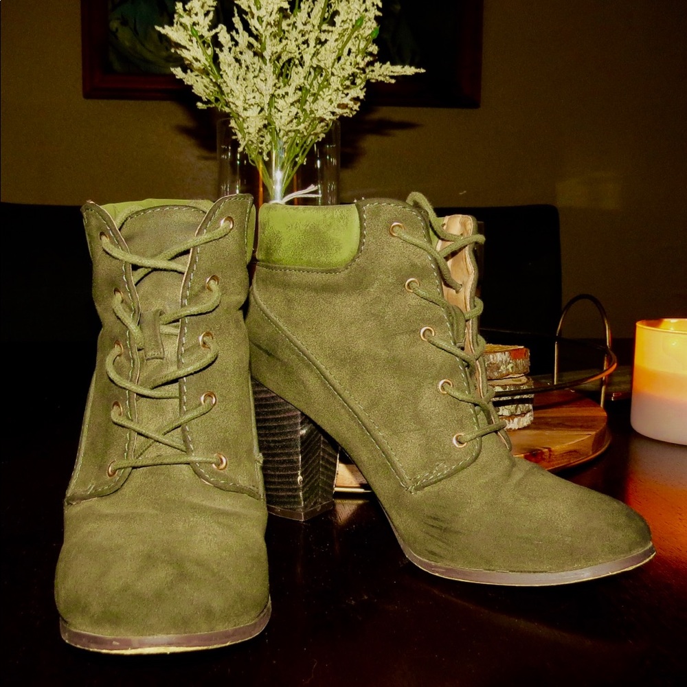 Lightly worn, Hunter green lace-up booties.